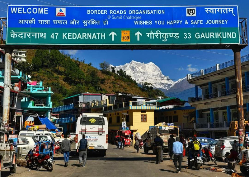 Scenic view of Guptkashi in Uttarakhand, part of the Kedarnath Tour Package by Magpie Group, showcasing mountain landscapes and temples.